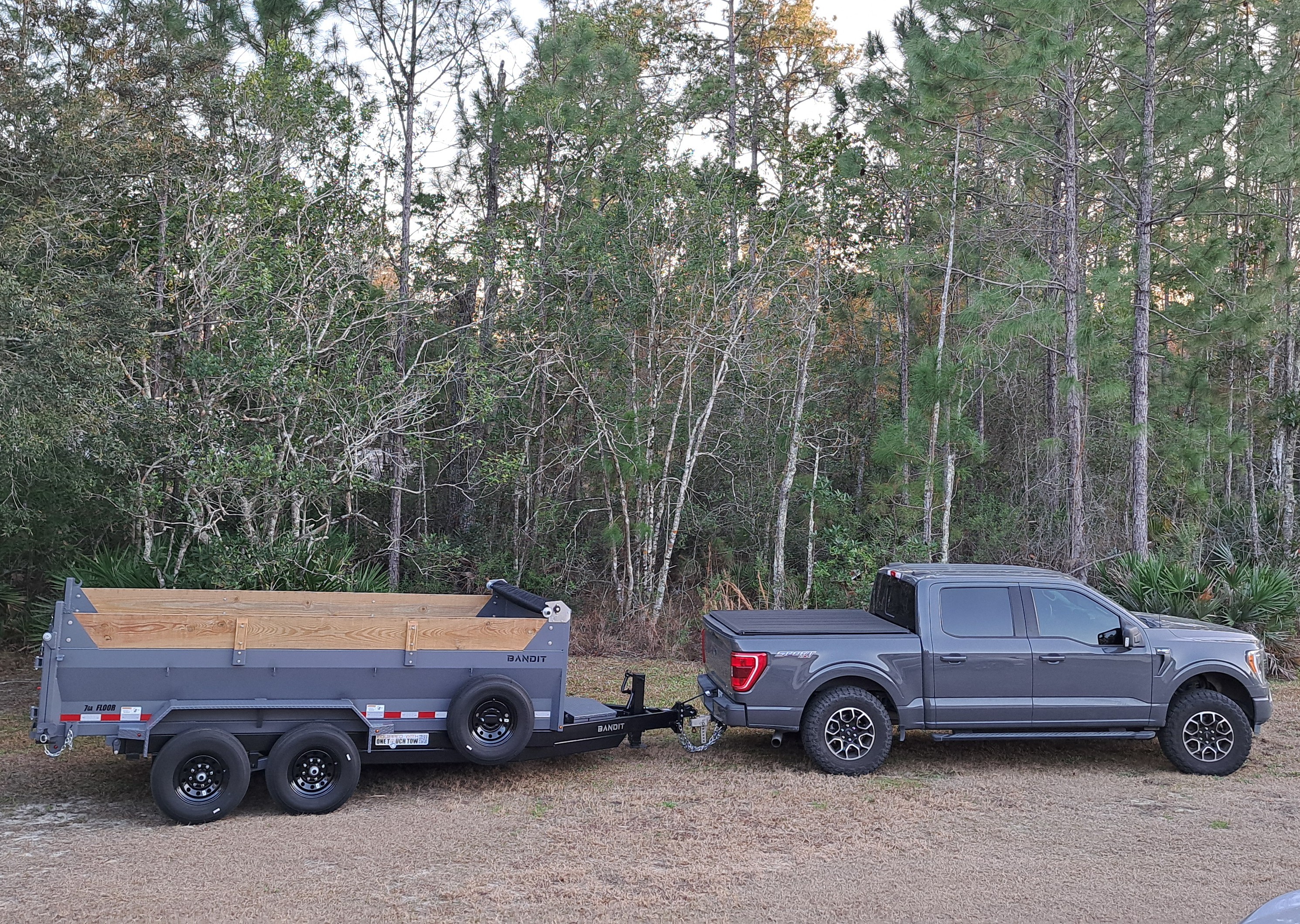 7x14 Bandit dump trailer hitched to Ford F-150