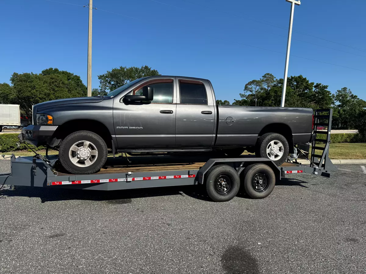 20ft car hauler trailer loaded with RAM 2500